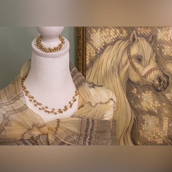 Tiny gold balls on a delicate string necklace and bracelet - Picture 10 of 11